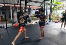 A picture of someone doing muay thai training at rage fight academy