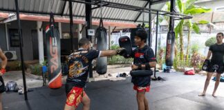 A picture of someone doing muay thai training at rage fight academy